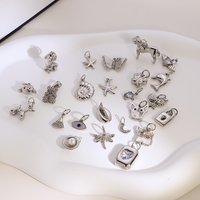 Pendentif en acier inoxydable pour la fabrication de bijoux DIY, gravé avec un chien, une étoile de mer, une étoile géométrique, breloques en acier inoxydable en gros