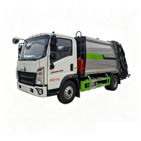 Camion compacteur de déchets puissant Sinotruk HOWO 8CBM avec structure de chargement arrière pour la collecte et l'expédition de déchets industriels