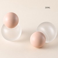 Flacon de fond de teint en verre dépoli sphérique de 30 ml, bouchon à bille rose mat, pompe à lotion, emballage pour soins de la peau, vente en gros