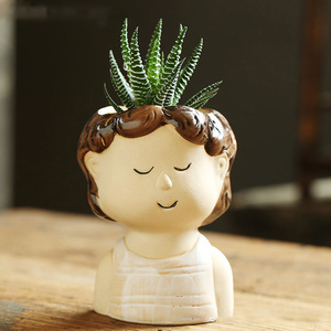 Venta al por mayor de diseño pintado <span class=keywords><strong>a</strong></span> <span class=keywords><strong>mano</strong></span> figura humana niñ<span class=keywords><strong>a</strong></span> cara cerámica suculenta maceta planta Cactus <span class=keywords><strong>Macetas</strong></span> - Product Image 2