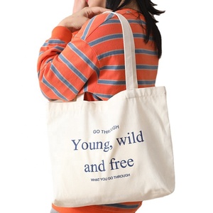 Grand sac fourre-tout en toile rayée avec citation inspirante, en coton écologique, idéal pour les étudiants, les trajets quotidiens et le shopping - Product Image 2