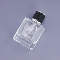Vente en gros de flacons vaporisateurs de parfum en verre plat transparent de 25 ml, vides, avec étiquette ronde, logo unique, impression sérigraphique sur parfum