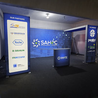 Stand de Exhibición Retroiluminado de 10x20 pies con Tela SEG y Mostrador para CES, NAB, Cosmoprof
