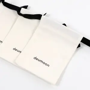 Petite pochette écologique en mousseline de couleur blanche Logo personnalisé toile de coton cadeau bijoux poussière sac à cordon