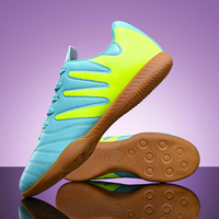 Chaussures de football prises en charge ODM/OEM pour hommes et femmes Vente en gros en usine de chaussures d'entraînement sportif d'intérieur antidérapantes Conception à fond plat