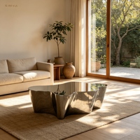 Table basse en acier inoxydable poli, forme sculpturale organique, finition miroir métal liquide, table centrale moderne pour salon