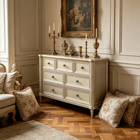 Commode de luxe à 7 tiroirs avec finition dorée, commode classique en bois pour le rangement de la chambre à coucher