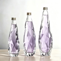 Bouteille d'eau en verre de luxe avec couvercle 330ml 350ml 500ml 750ml 1000ml Bouteilles en verre pour l'eau Bouteille en verre avec logo Forme unique