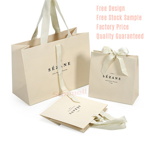 Recycled Luxury Cream Beige Kraft Paper Shopping Bag with Your Own Logo Ribbon Handle Bow for Gift Packaging Custom Printing