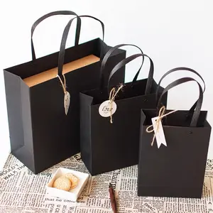 Wholesale Luxury Matte Black Gift Shopping Paper Bag Custom Logo Clothing Shopping Gift Jewelry Wine Packaging Bag