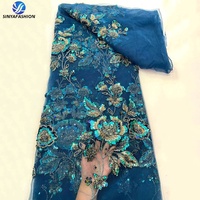 Nouvelle conception de dentelle française brodée de perles et de paillettes, dentelle de haute qualité de style floral pour robe femme, tissus de dentelle en filet avec perles et paillettes
