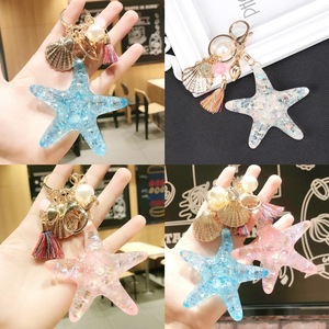 Nouveauté porte-clés étoile de mer en acrylique fantaisie avec pompon Island Girl Collection pendentif à breloques accessoire de sac - Product Image 2