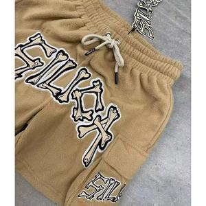 กางเกงขาสั้นชายหาดผ้าคอตตอน100% ผสมสีสำหรับผู้ชายกางเกงขาสั้นสไตล์สตรีทแวร์แห้งเร็วมีโลโก้ตามสั่ง - Product Image 3