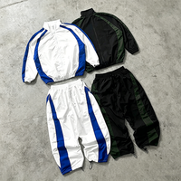 Ensemble de survêtement en nylon personnalisé YYSY OEM pour hommes, veste coupe-vent et pantalon de jogging à rayures