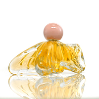 Flacon de parfum en verre en forme de papillon 100 ml, finition mate/givrée, pompe transparente à sertir, impression sérigraphique personnalisée