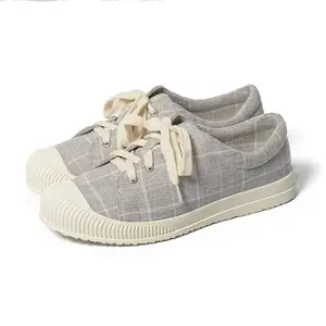 Großhandel Low Cut Vulcan ized Sneakers lässig Flat Canvas Schuhe Frauen Plaid Baumwolle Canvas Schuhe für Damen