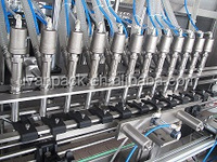 Ligne de production de jus à remplissage à chaud de grande capacité avec pasteurisation et rinçage des bouteilles