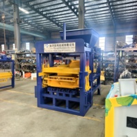 Machine à fabriquer des briques creuses, pleines et emboîtables entièrement automatique Zhongke QT 4-15