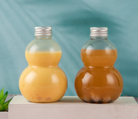 Nouveau design 100ml 200ml 300ml Vase en plastique à double gourde en forme de bouteille de boisson de jus d'animal familier