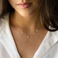 eManco 10PCS Collier délicat en acier inoxydable avec perles et chaîne flottante en fausses perles pour femme, usage quotidien