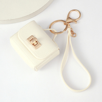 Mini sac à dos porte-clés pour femmes, jolie pochette à monnaie en cuir PU avec porte-clés, sac de maquillage multi-poches, porte-cartes, organiseur de câbles