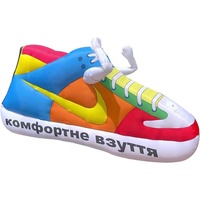 Réplique de chaussure gonflable promotionnelle pour les événements de marques sportives, modèle de sneaker gonflable à imprimé zèbre personnalisé