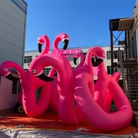 Arche de ballons gonflables géants en forme de flamant rose pour les décorations d'événements de festivals de musique électronique