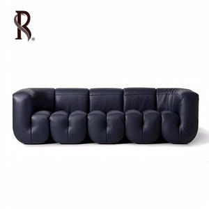 Canapé en cuir véritable vintage Rising Swiss Direct Row, canapé combiné modulaire de <span class=keywords><strong>magasin</strong></span> de vêtements créatifs de personnalité de créateur - Product Image 1