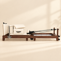 Reformer de Pilates commercial portable et pliable en bois de chêne avec plateforme de saut pour la maison, la salle de sport et l'entraînement physique