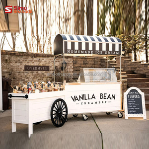 Chariot de présentation de bonbons personnalisé avec logo, en PVC et bois blanc, pour desserts et glaces, avec enseigne LED en acrylique, idéal pour mariages, fêtes et événements. - Product Image 3