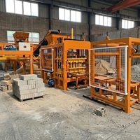 Machine à briques vibrante à commande PLC QT6-15, ligne de production de blocs creux, équipement de pavage autobloquant, palettes et pièces