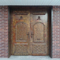 Porte battante à double feuille en cuivre orné, artisanale, de qualité supérieure, de style vintage, pour cour de villa élégante