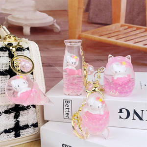 Nouveau créatif mignon flottant liquide porte-clés pour sac voiture acrylique porte-clés dessin animé Hello Kitty Couple liquide porte-clés - Product Image 1