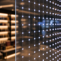 Écran LED transparent pour vitrine de magasin duty-free d'aéroport