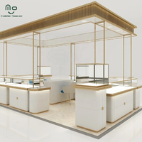 Comptoir de présentation de bijoux en acier inoxydable au design élégant, vitrine décorative pour centre commercial, éclairage LED, écologique et robuste