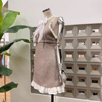 Gaun Wanita Model Vest Rok Tanpa Lengan Kerah Bulat dengan Aksen Pita Kupu-kupu Kecil dan Renda Patchwork
