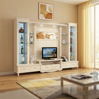Meuble TV extensible moderne et minimaliste en bois blanc avec éclairage LED à couleur réglable et étagères, à poser au sol pour salon