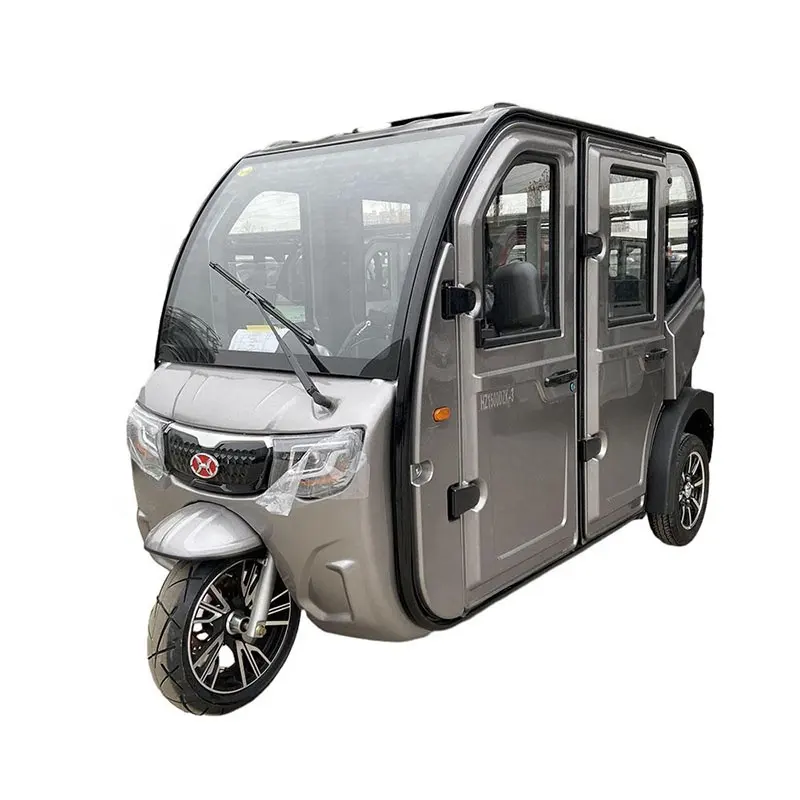 2024 tricycle de passagers fermé électrique de pousse-pousse de taxi confortable personnalisé pour transporter des passagers