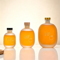 Bouteilles en verre givré rondes vides de haute qualité de 100 ml, 250 ml, 500 ml pour jus, vin et autres boissons, idéales pour l'emballage de vin de fruits