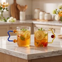 Gobelet à eau en verre borosilicate de haute qualité avec poignée colorée et boule
