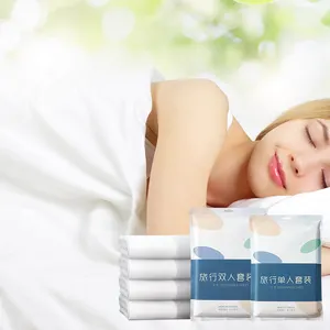 Ücretsiz örnek otel dokunmamış yastık kılıfı tek kullanımlık yatak çarşafı set