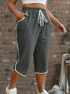 Pantalones de tres cuartos elásticos cómodos a la moda para mujer de talla grande 1XL-5XL para mujer, pantalones informales con bolsillos funcionales de Color sólido - Product Image 4