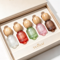Flacons compte-gouttes en verre givré de luxe de 10 ml avec boîte cadeau haut de gamme sérigraphiée pour ensemble d'huiles essentielles et de soins de la peau