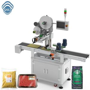 Machine automatique d'étiquetage des surfaces supérieures des sacs et des boîtes, machine à coller des étiquettes adhésives - Product Image 1