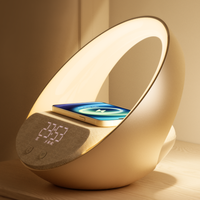 2024 Gloednieuw product 4-in-1 multifunctionele draadloze oplader LED nachtlamp bureaulamp met wekker en muziekspeaker