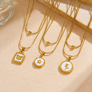 Elegante Juego de Colgantes Esmaltados de Acero Inoxidable con Baño de Oro PVD de 18K, Resistentes al Deslustre, con Dijes de Mariposa, Estrella y Rosa, Ideales para Combinar en Capas o Regalar - Product Image 1