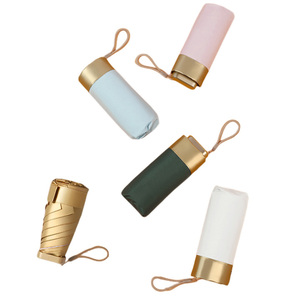 Vente en gros sombrillas personnalisé mini petite capsule soleil uv poche pour téléphone étanche 5 pliant uv petit parapluie avec logo - Product Image 1