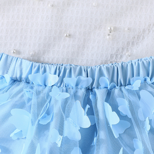 Conjunto de Dos Piezas para Niñas al por Mayor: Top Corto de Tirantes a la Moda y Falda de Malla Bordada con Diseño de Lazos y Cordón Ajustable de Lana - Product Image 6