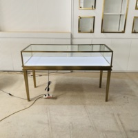 Vitrine de présentation de bijoux haut de gamme en acier inoxydable plaqué titane, verre trempé transparent, éclairage LED pour centres commerciaux