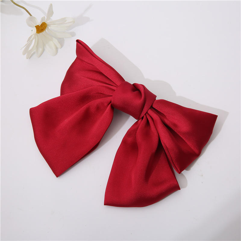 Red bow hair clip